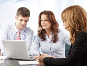 Expert staff explaining deal terms carefully.